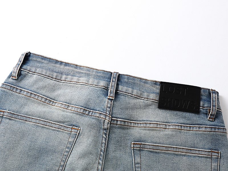 LOSTSHDWS Daisy Appliqu¨¦ Flared Jeans ¡ª detail