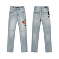 AMIRI Light Blue Patch Detail Slim Tapered Jeans ¡ª hero