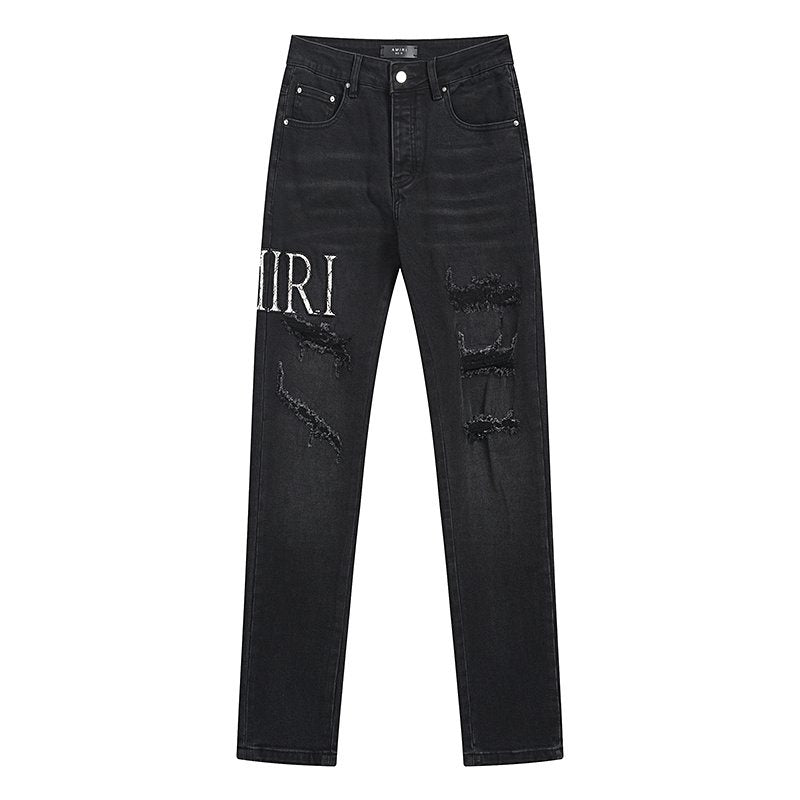 AMIRI Distressed Slim Tapered Jeans ¡ª hero