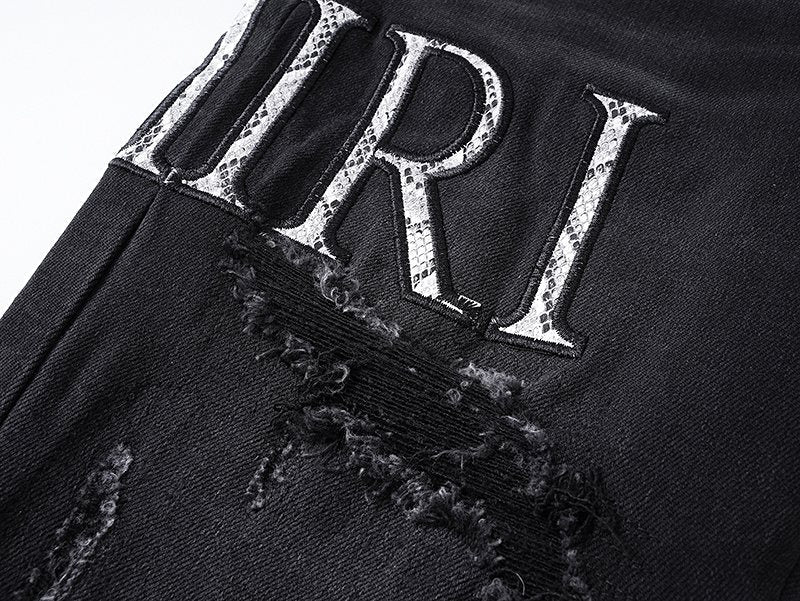 AMIRI Distressed Slim Tapered Jeans ¡ª detail