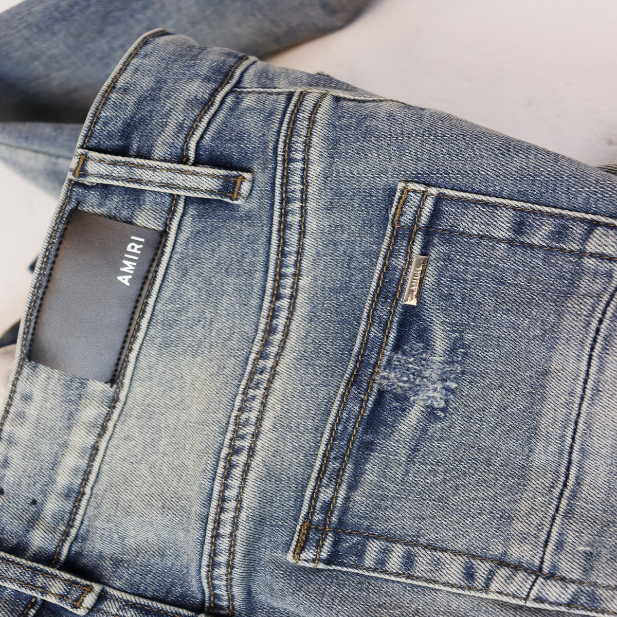 AMIRI Sinners Distressed Skinny Jeans ¡ª detail