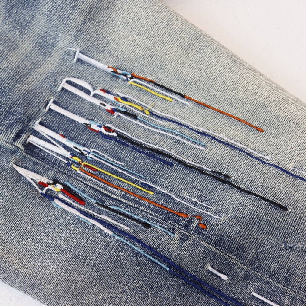 AMIRI Sinners Distressed Skinny Jeans ¡ª detail