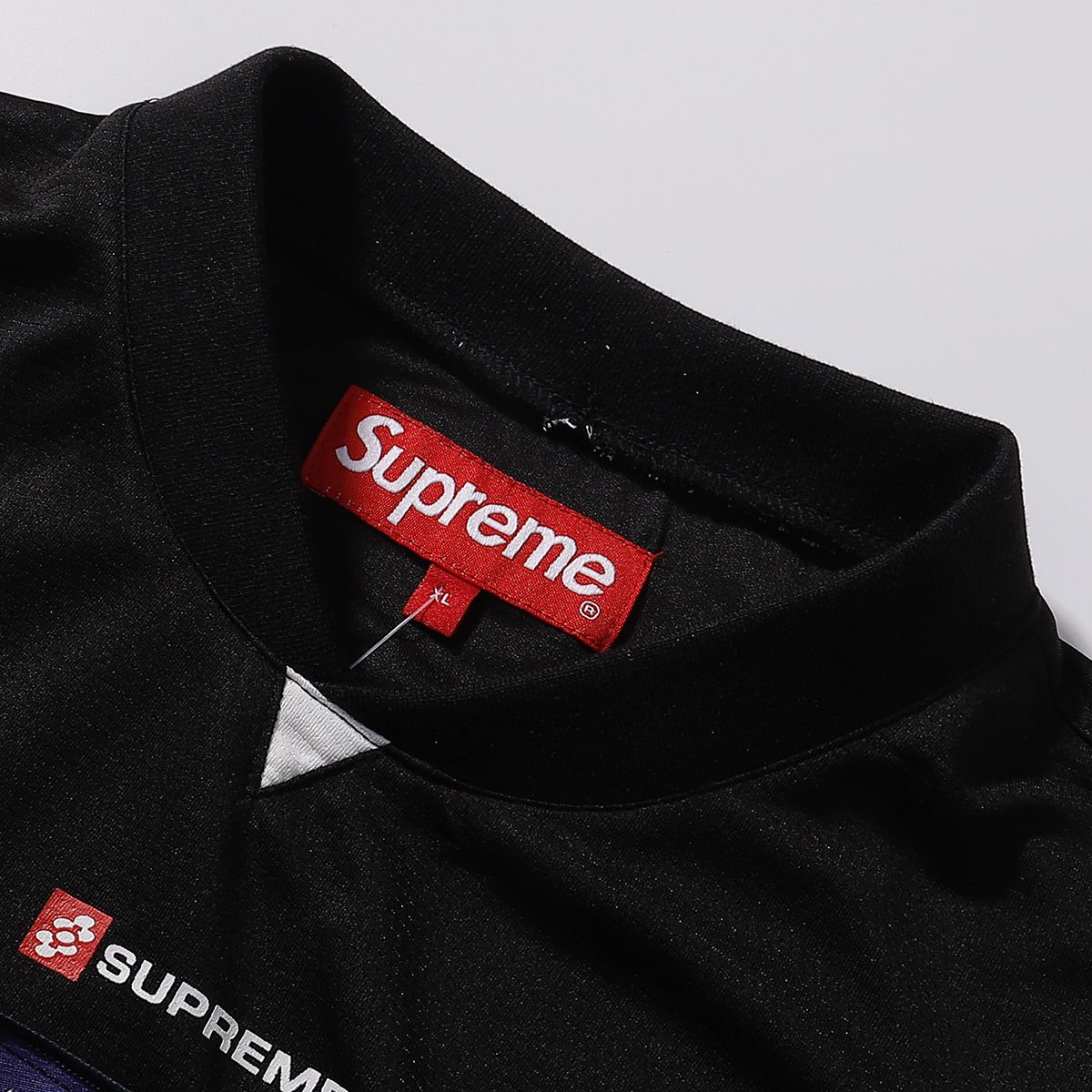 Supreme Black Soccer-Inspired Jersey Graphic T-Shirt ¡ª neck_label