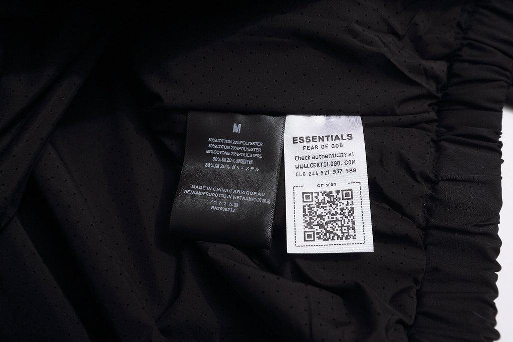 Fear of God Essentials Half-Zip Windbreaker Jacket ¡ª neck_label
