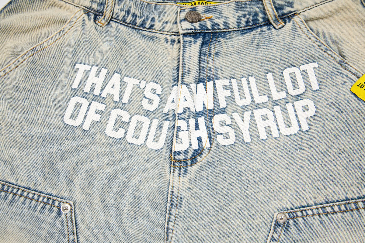 THAT'S A AWFUL LOT OF COUGH SYRUP Washed Denim Graphic Shorts ¡ª detail
