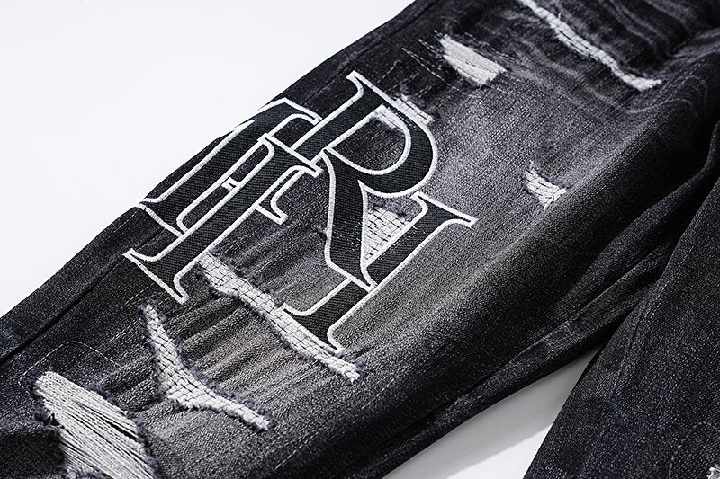 AMIRI Black Distressed Letter Graphic Jeans ¡ª detail