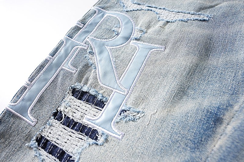 AMIRI Light Blue Letter Graphic Distressed Jeans ¡ª detail