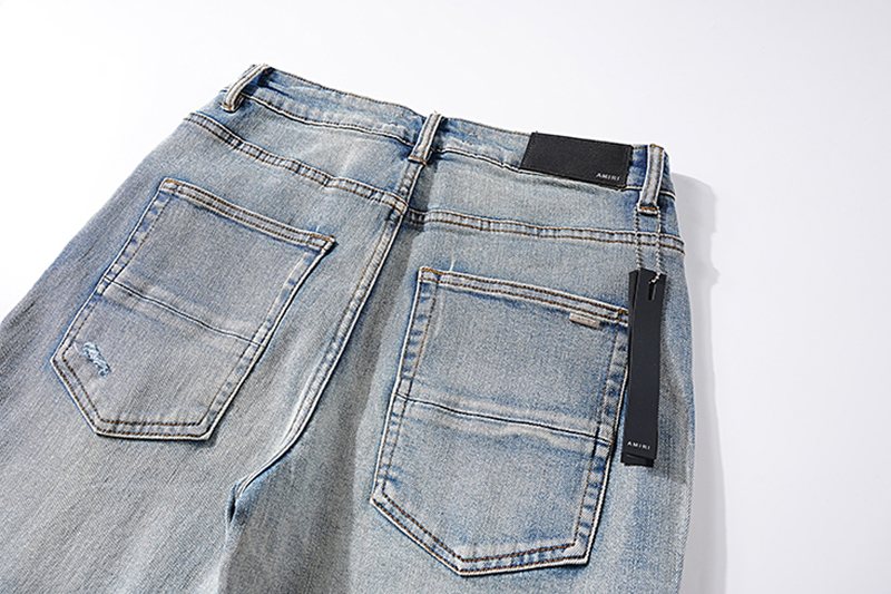 AMIRI Light Blue Letter Graphic Distressed Jeans ¡ª detail