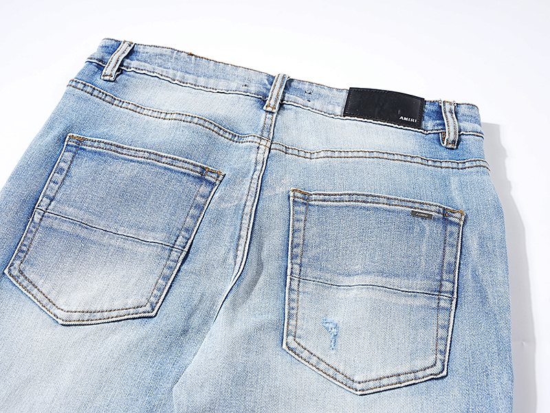 AMIRI Light Blue Distressed Paneled Jeans ¡ª detail