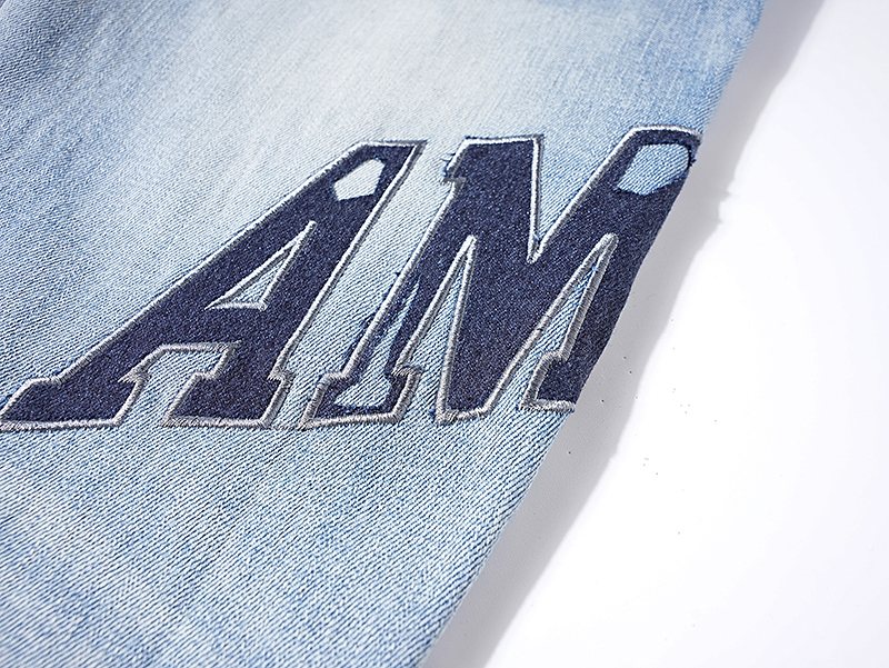 AMIRI Light Blue Distressed Paneled Jeans ¡ª detail
