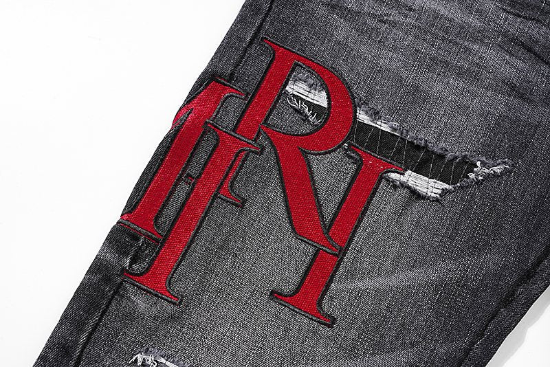 AMIRI Red Letter Graphic Washed Jeans ¡ª detail