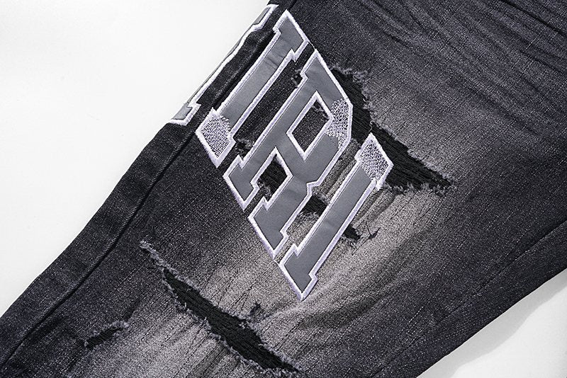 AMIRI Distressed Washed Black Graphic Jeans ¡ª detail