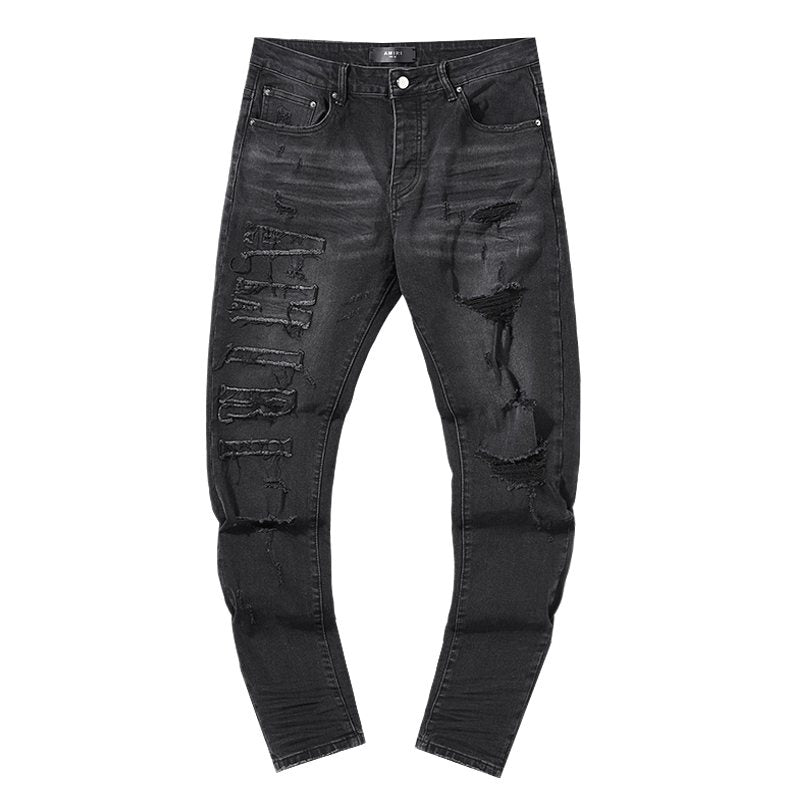 AMIRI Distressed Black Washed Jeans ¡ª front