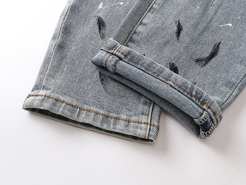 AMIRI Light Blue Distressed Paint Splatter Jeans ¡ª detail