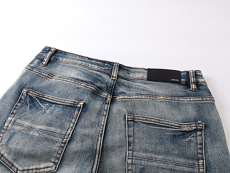 AMIRI Light Blue Distressed Letter Applique Jeans ¡ª detail
