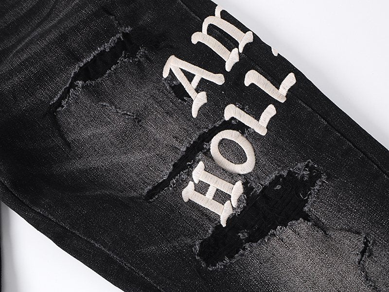 AMIRI Hollywood Lettering Distressed Jeans in Black ¡ª detail