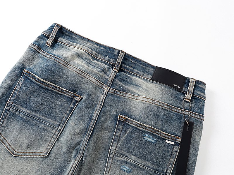 AMIRI Light Blue Distressed Appliqu¨¦ Jeans ¡ª detail