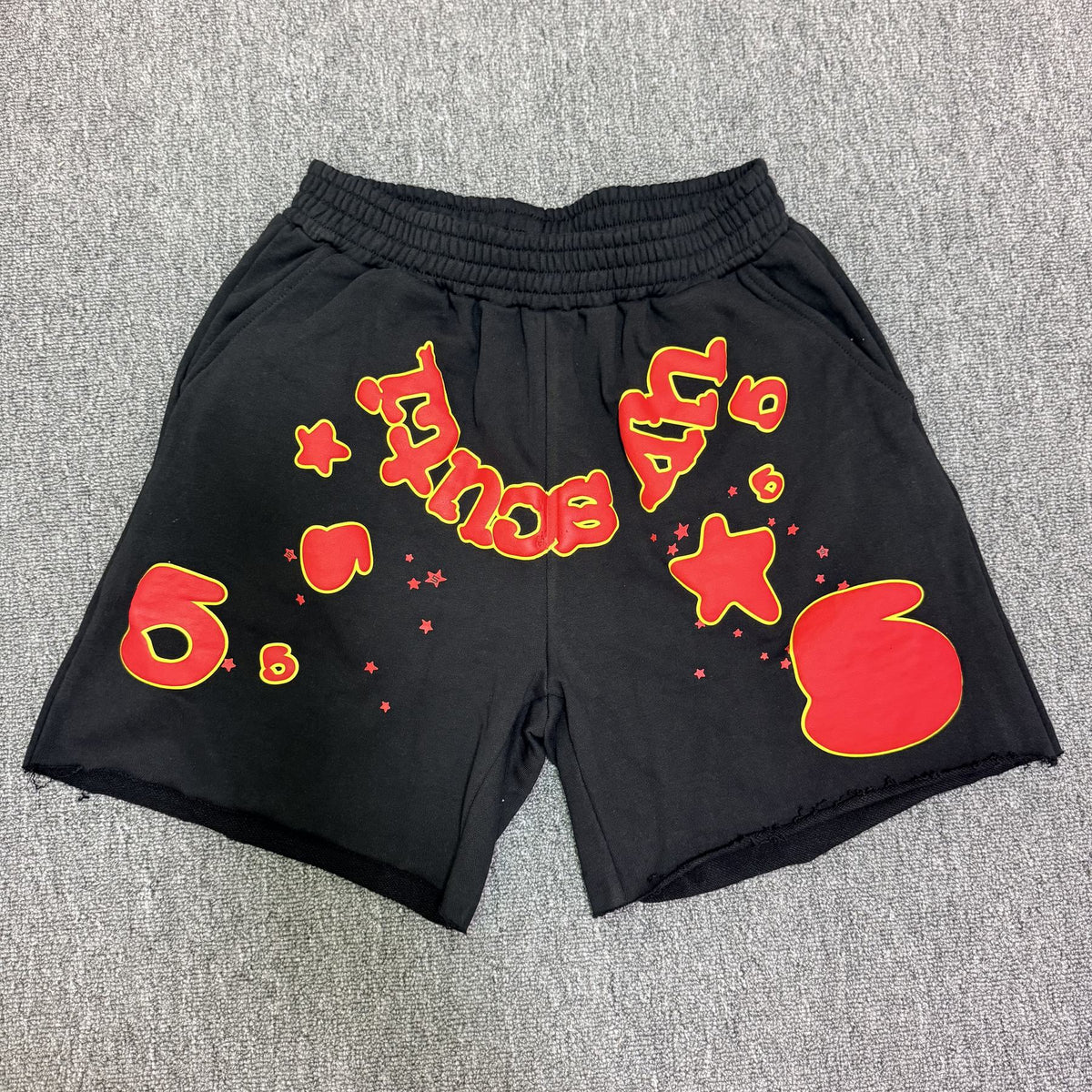 Sp5der Black Graphic Raw-Hem Shorts ¡ª front