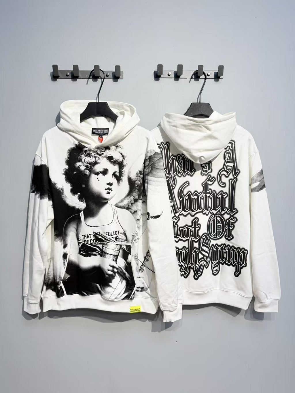 THAT'S A AWFUL LOT OF COUGH SYRUP Angel Graphic Hoodie ¡ª context