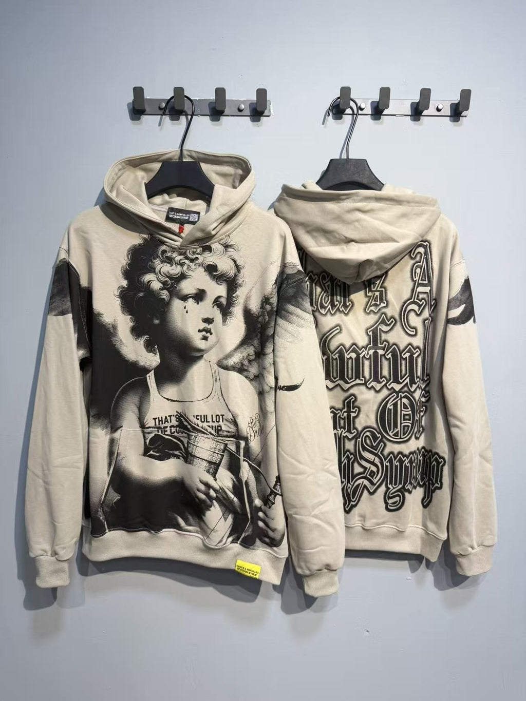 THAT'S A AWFUL LOT OF COUGH SYRUP Angel Graphic Hoodie ¡ª context