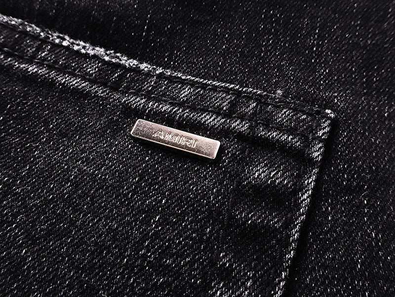 AMIRI Varsity Letter Appliqu¨¦ Distressed Jeans ¡ª detail