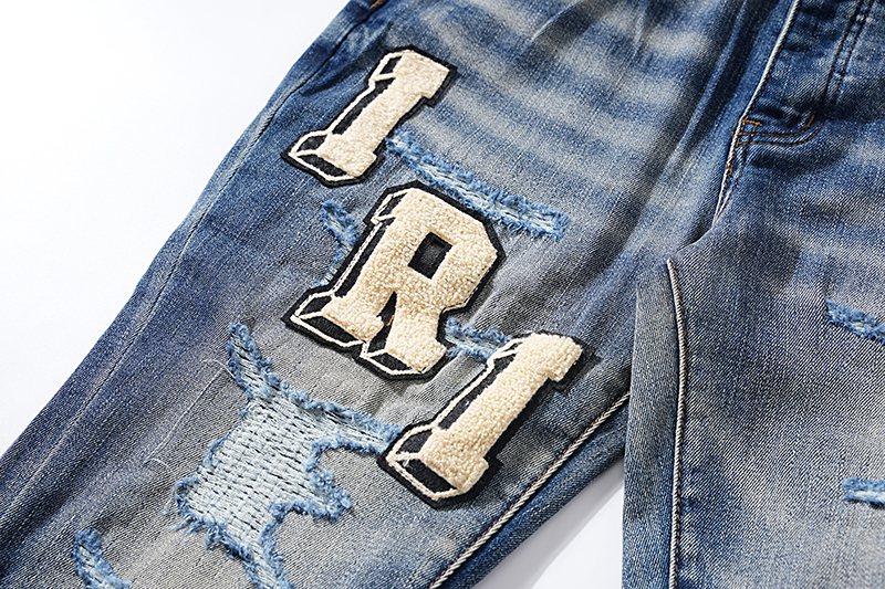 Amiri Varsity Letter Patch Distressed Jeans ¡ª detail